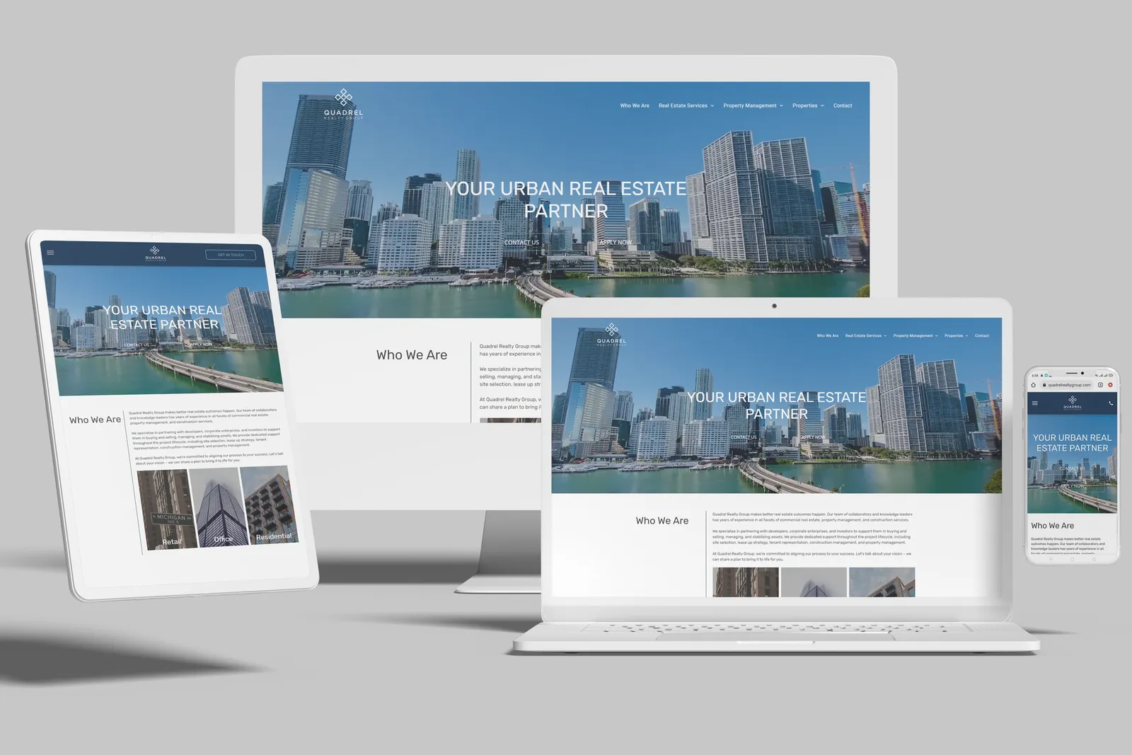 Real estate website shown on desktop, laptop, tablet and phone